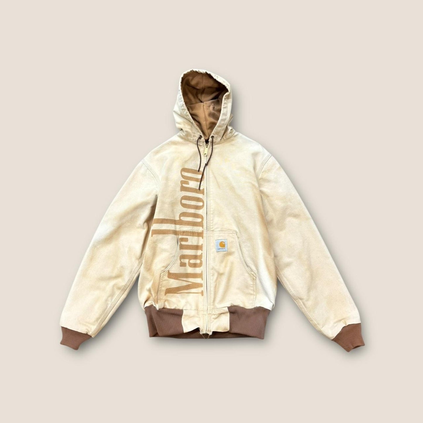 Cream and brown carhartt jacket