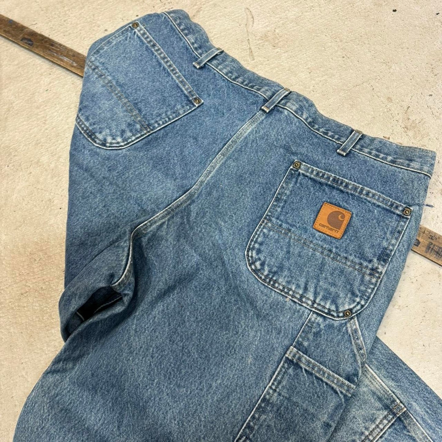 Blue carpenter jeans with a