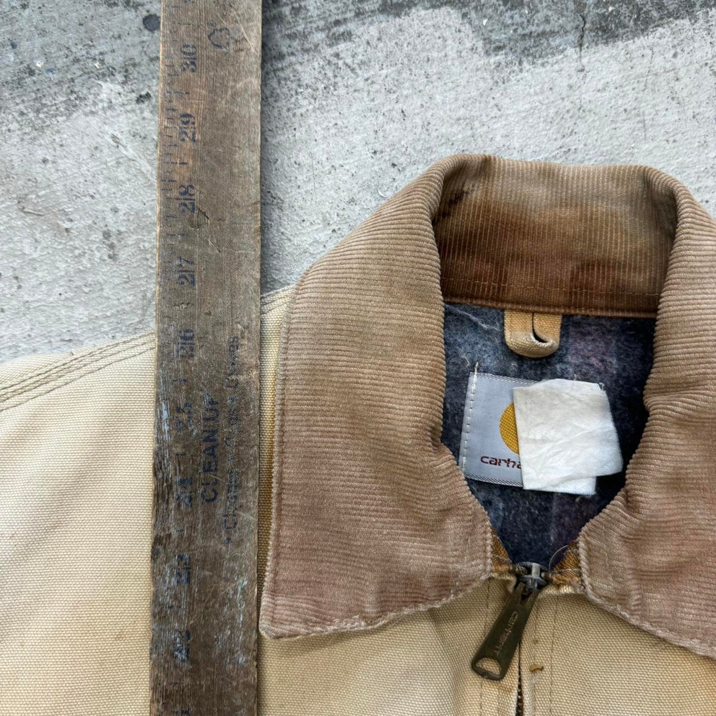 Tan and brown carhartt jacket