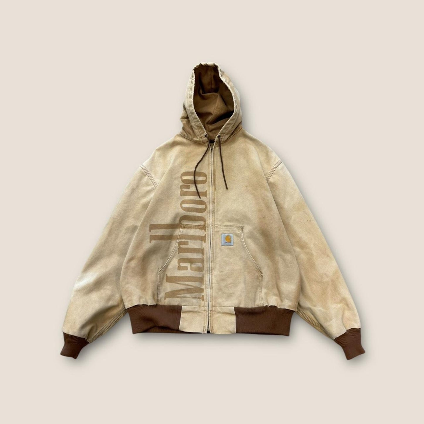 Cream and brown carhartt jacket