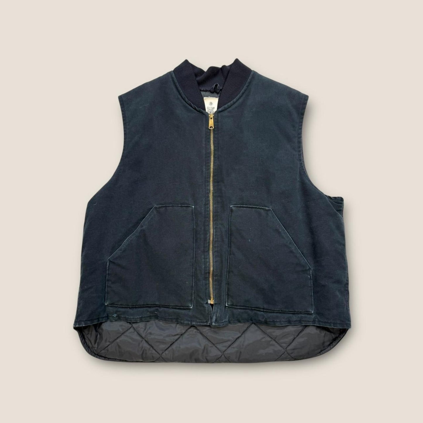 Black quilted vest with