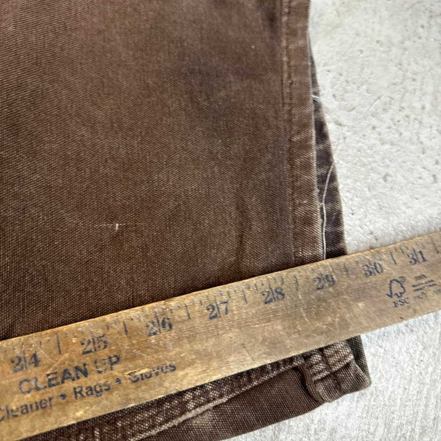 Brown carpenter pants with a