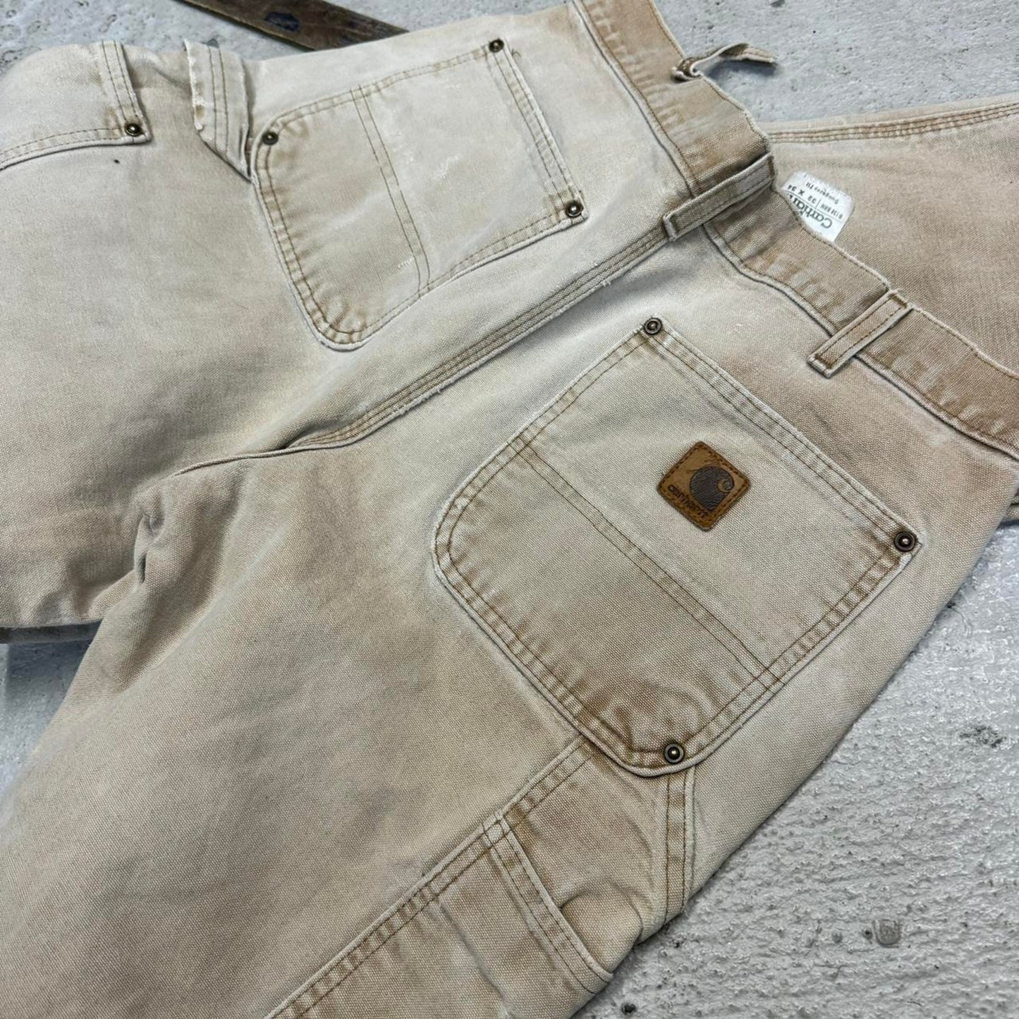 Tan and cream carpenter pants