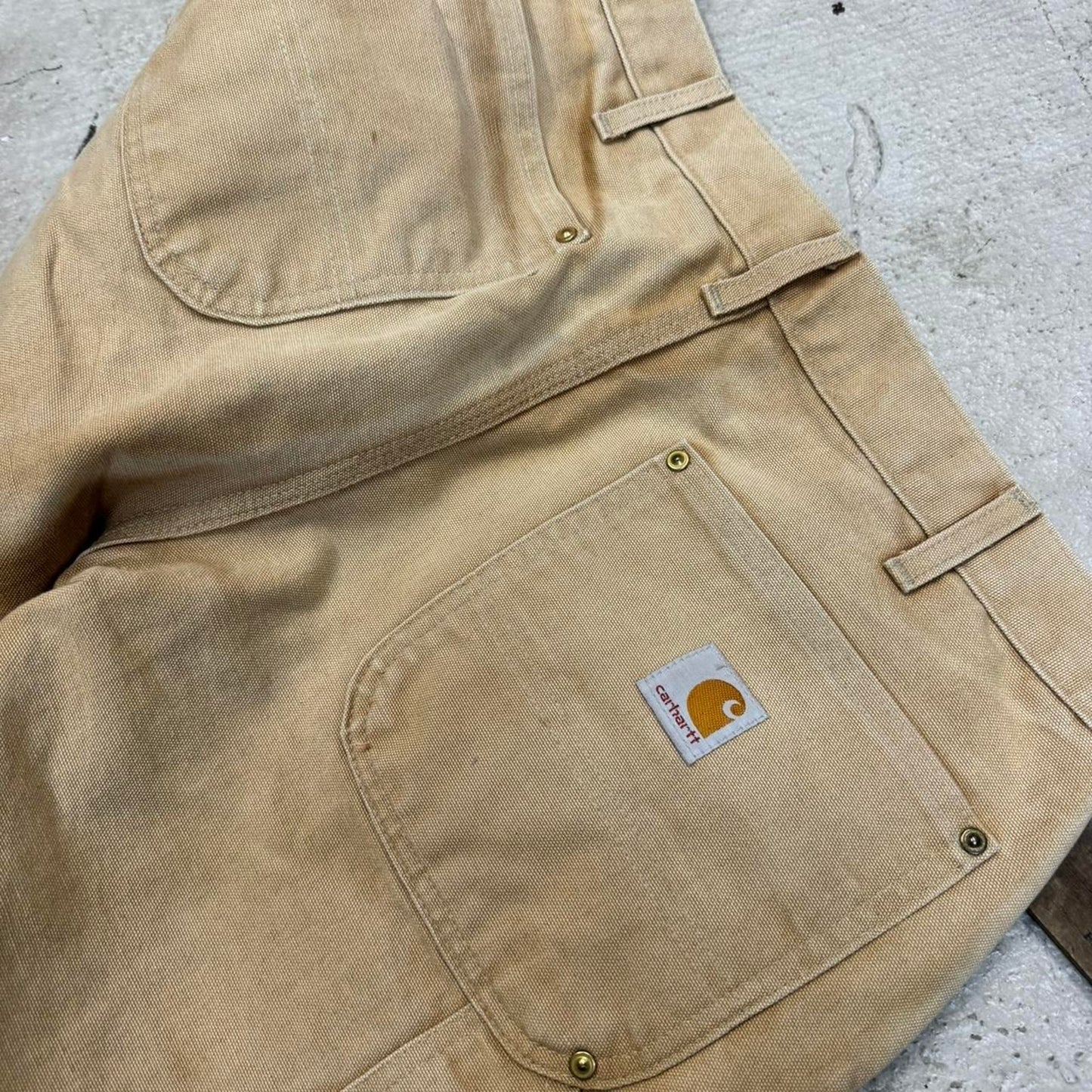 Tan and cream carpenter pants